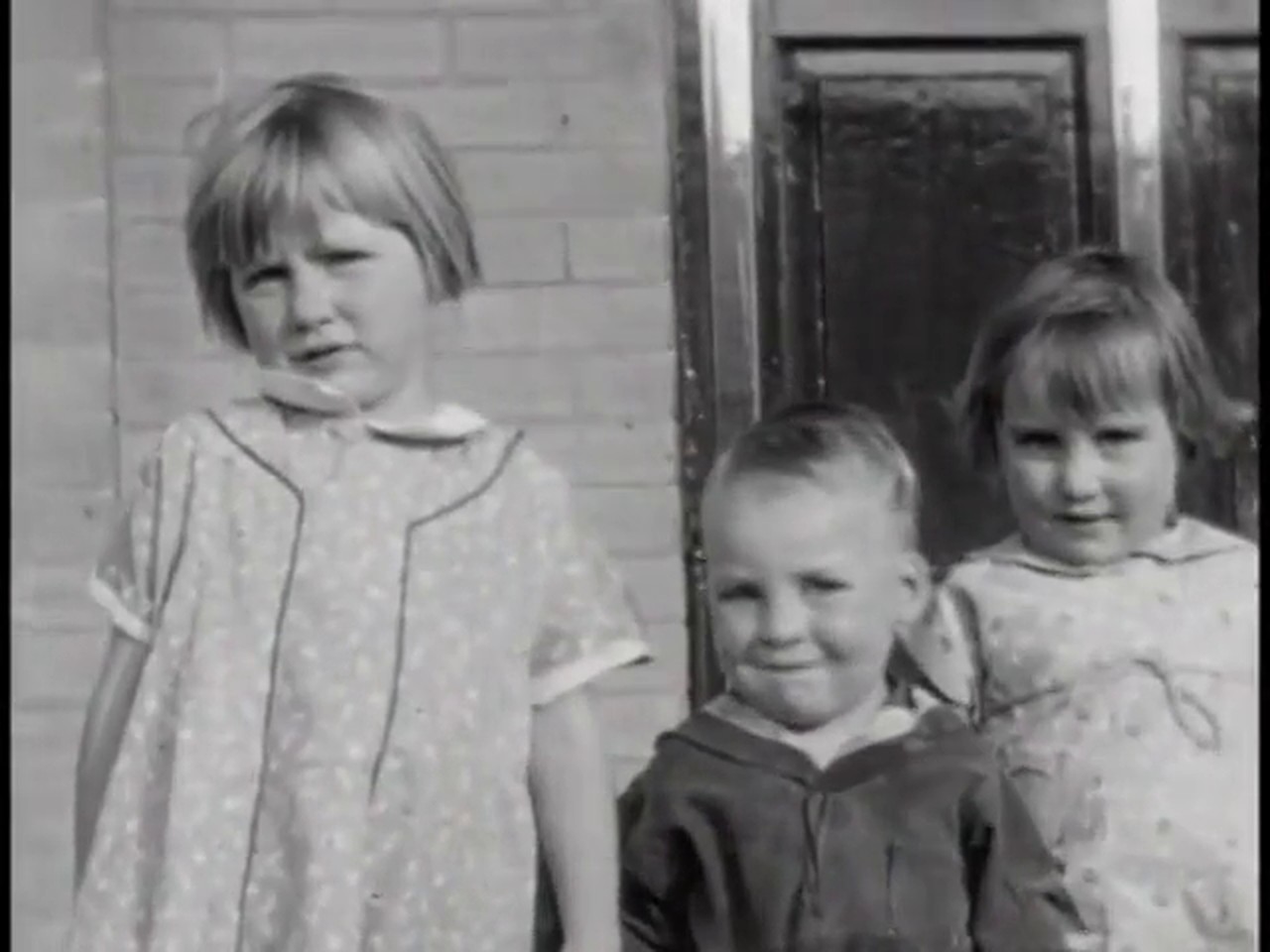 Original frame from the same 1938 film, soft and faded