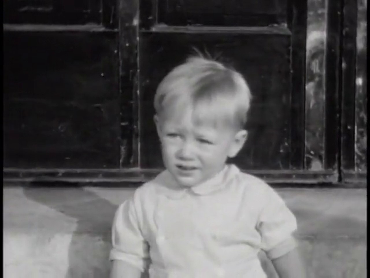 Original frame from the same 1938 film, soft and faded